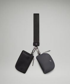 two small black pouches are attached to a lanyard