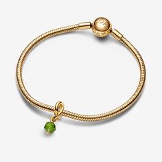 Wear a symbol of forever, that's personal to you. This 14k gold-plated dangle charm is made up of a triple knotted circle that intertwines to resemble an infinity sign. The twist carries a faceted spring green man-made crystal, which dangles from the charm. Wear yours to add a drop of colour to your carrier, or gift it to the one you want in your life forever. - Pandora August Spring Green Eternity Circle Dangle Charm - 14k Gold-plated unique metal blend / Man-made crystal / Light green Charms Disney, Pandora Essence, Infinity Sign, Bracelet Tennis, Crystal Light, August Birth Stone, Dangle Charms, Spring Green, Green Man