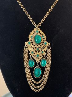 -Green Cabochon Necklace  -Gold Tone Open Work -Whiting & Davis Designer  -Very Good Condition ( a little wear -priced accordingly ) Gold Bohemian Chain Necklace With Jewels, Bohemian Metal Necklace With Jewels, Bohemian Jewelry With Large Pendant For Party, Vintage Green Jewelry With Chain, Bohemian Green Jewelry With Adjustable Chain, Bohemian Green Jeweled Necklaces, Bohemian Green Necklace With Jewels, Green Bohemian Jeweled Necklace, Bohemian Long Necklace With Jewels