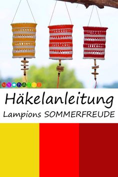 three colorful lanterns hanging from a tree branch with the words hakellanltung