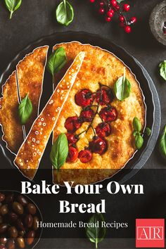 the cover of bake your own bread, with olives and tomatoes on it