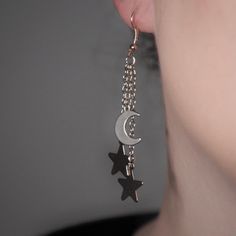 "These sterling silver coated stainless steel earrings feature a silver chains with a singular silver stainless steel moon and star charms at the very end of each piece of chain. All is completely handmade by myself just for you. *NICKEL AND LEAD FREE* These earrings are perfect for anyone, but especially for someone that wants a simple yet cute pair of earrings. The layers give lovely dimension while the added charms give a little extra weight. To prolong the life of your jewelry... -Don't wear Star Earrings Dangle, Stars Earrings, Silver Star Earrings, Moon And Star Earrings, Earrings Halloween, Silver Coat, Moon And Star, Silver Moon, Moon Charm