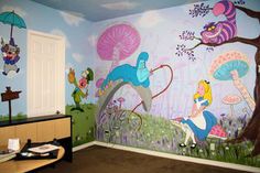 a child's bedroom decorated with colorful murals