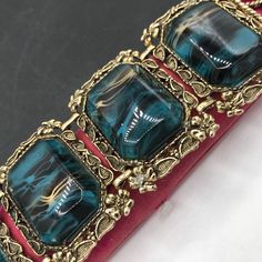 365.00 USD Stunning Victorian revival style Selro bracelet in excellent vintage condition. Bracelet measures seven and three-quarter inches long by 2 inches wide and the earrings measure 1 1/4 x 1 1/4”. Simply a stunning addition to any wardrobe or jewelry collection. #vintage #green #wide #selro #bracelet #jewelry d89 Vintage Green Bracelets For Party, Handmade Rectangular Retro Jewelry, Retro Green Bracelet Jewelry, Victorian Green Nickel-free Jewelry, Victorian Nickel-free Green Jewelry, Luxury Vintage Green Cuff Bracelet, Green Victorian Multi-stone Jewelry, Vintage Lucite Jewelry, Lil Black