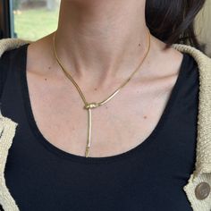 14KT yellow gold solid serpent/ snake head clasp herringbone chain necklace. Serpent head clasp is adjustable to clasp on any part of the chain! Wear as a choker lariat style or wear long! Length: 18" Weight: 9.55 grams Stamped 14K on clasp Solid Clasp measures: 5.3 x 13.9 x 2.7mm Serpent Snake, Snake Head, Herringbone Chain, New Launch, Long Length, Herringbone, Choker, Chain Necklace, Product Launch