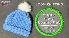 a blue and green knitted beanie with a white pom - pom