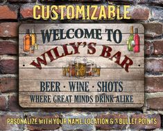 a brick wall with a wooden sign that says, welcome to willy's bar