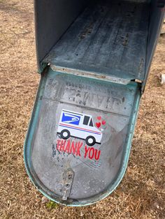 an old mailbox with the words thank you written on it