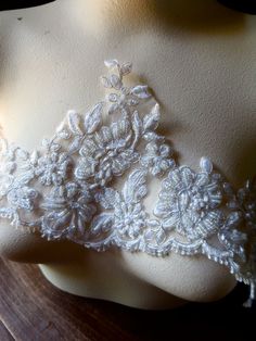 "Beaded silver and cream on a very fine tulle backing.... much nicer than the photos would lead you to believe.... an absolutely smashing lace! Listing is for a piece 51\" in length at a REDUCED PRICE Measures 6\" from scallop to point.... More lace, stretch lace, appliques, flowers, leaves and other lovelies located here: LACES: http://www.etsy.com/shop/MaryNotMartha?section_id=6414105 STRETCH LACES: http://www.etsy.com/shop/MaryNotMartha/search?search_query=STRETCH+LACE&search_submit=& Cream Lace With Pearl Embroidery, Flowers Leaves, Beaded Lace, Stretch Lace, Costume Design, Appliques, Faux Pearl, Diamond Bracelet, Lace Trim