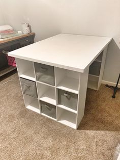 a white desk with several drawers in it