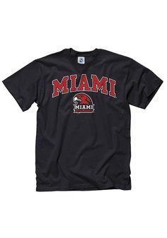 Show off your team pride in this Miami Redhawks Black Arch Logo Short Sleeve T Shirt! This Miami of Ohio Short Sleeve Tee features a screen printed team wordmark and logo. Make sure everyone knows you root for the Redhawks with this Black Miami of Ohio T Shirt. Go Redhawks! Classic Fit, Tubular construction, Taped neck and shoulders, Quarter-turned to eliminate center crease, Unisex, Fit: True to Size, 100% Cotton Collegiate Short Sleeve Fan Gear Shirt, Short Sleeve Team Name Shirt For Fans, Collegiate Short Sleeve Shirt With Team Name, College Fan Apparel Shirt With Logo Print, Black Fan Apparel Shirt For Game Day, Black Arch, Missouri Mule, Arch Logo, Owl T Shirt