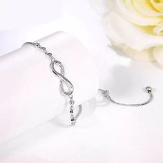 Minimalist Luxurious Crystal Bracelet Silver Color Adjustable Infinity Charm Bracelets for Women Fashion Jewelry Let this beautiful bracelet remind you or someone you love that they have value and infinite worth. Let someone know you will love them forever. This bracelet will make a great bridesmaid, anniversary, birthday, graduation, and Sweet 16 gift. Perfect for bridesmaid proposal too... **Nickle and lead-free   *Zinc Alloy Length .24 cm Weight 4.19 g Charm Bracelets Diy, Infinity Charm Bracelet, Valentines Day Jewelry, Feather Bracelet, Infinity Jewelry, Bracelets Diy, Crystal Chain, Self Worth, Stylish Jewelry