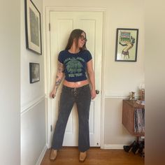 This is an iconic pair of Y2K vintage low rise jeans. Made by Arizona, they are a stretch denim in a grey black wash with minor brown undertones. They lace up the front - very Britney Spears vibes! They are slightly flared. Overall in good vintage condition with no major flaws to note. Marked a size 15 but note measurements in photos for best fit - specifically rise. Approximately a medium to large. Low Rise Mid Size, Grey Jeans Outfit, Lace Up Jeans, Jean Vintage, Jeans Y2k, Rocker Chic, Womens Jeans, Grey Jeans, Low Rise Jeans