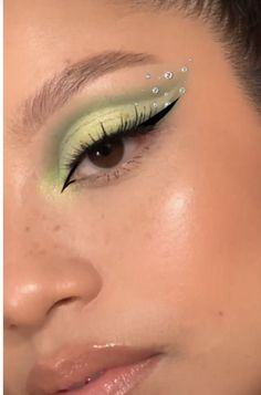 "Oh Christmas brow, oh Christmas brow, how lovely are your arches... Fairy Rhinestone Makeup, Green Gem Eye Makeup, Sage Prom Nails, Fairy Eye Makeup Looks, Eyeshadow Green Looks, Sage And Black Outfit, Green Look Makeup, Green Makeup With Gems, Green Fairy Makeup Halloween