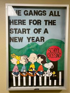 a poster on the wall that says we gangs all here for the start of a new year