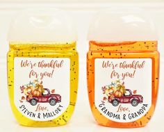 two jars of honey with pumpkins on them and we're grateful for you stickers