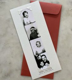 a card with three photos of people on it and a red envelope next to it