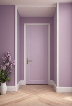 an empty room with purple walls and white trim on the doors is shown in this image