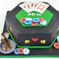 a cake made to look like a casino table with cards and chips on it,