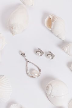 Our freshwater pearl open teardrop pendant is a beautiful addition to any collection. The sleek sterling silver perfectly sets the focus on the smooth freshwater pearl. This versatile piece can be dressed up or dressed down for any occasion.