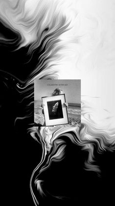 a black and white photo with an abstract background