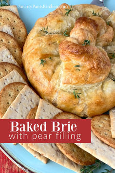 Brie in puff pastry on serving platter. Turkey Pear Brie Sandwich, Baked Brie And Pears, Stuffed Brie Puff Pastries, Pear Baked Brie, Brie And Pear Puff Pastry, Pear And Brie Appetizer, Pear Brie Puff Pastry, Brie With Puff Pastry, Pear Brie Appetizer