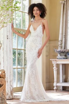 Dixie by Ines Di Santo is a beaded column shaped wedding gown with thin straps and a V-neckline. Dixie is a perfect beach wedding gown. With all the beading, it would be perfect on the beach or waterfront! Gown Couture, Beaded Wedding Gowns, Beach Wedding Gown, Couture Bridal Gowns, Spring 2025, Couture Bridal