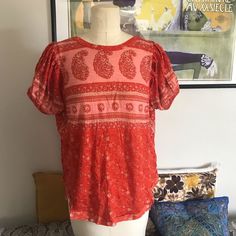 Free People Paisley Tee In Fruit Punch Color Size Small. Nwt. Paisley And Floral Print High/Low Hem ( Longer In The Back) Round Neck Pullover Style 61%Cotton/39%Modal Fabric Machine Wash Approximate Measurements 24”-28” Shoulder To Hem Smoke Free Home Bohemian Patterned Short Sleeve Tops, Bohemian Short Sleeve Patterned Tops, Bohemian Patterned Short Sleeve Blouse, Red Bohemian Crew Neck Blouse, Casual Boho Print Blouse With Relaxed Fit, Casual Relaxed Fit Blouse With Boho Print, Patterned Boho Print Short Sleeve Blouse, Spring Cotton Paisley Print Tops, Spring Cotton Tops With Paisley Print