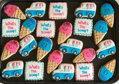 decorated cookies in the shape of cars and ice cream cones with what's the scoop? written on them