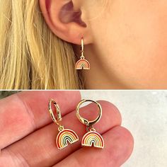 Cute mini gold rainbow hoop huggie earrings for children!  These colorful rainbow 18k gold plated small hoop earrings make the perfect gift for your little girl.  Hinge closure for easy on/off.   D E T A I L S: -Children's colorful mini rainbow hoop huggie earrings -14mm size -Stainless Steel, 18k gold plated -Trendy, minimalist design -Perfect for any occasion! V I E W - O U R - O T H E R - K I D S - J E W E L R Y: https://www.etsy.com/shop/JewelryVV?section_id=22076012 See all of our designs: Baby Earrings, Girl Rainbow, Earrings Cute, Huggie Earrings, Birthday Gifts For Kids, Hoop Earrings Small, Jewelry Earrings Hoops, Huggies Earrings, Toddler Girl