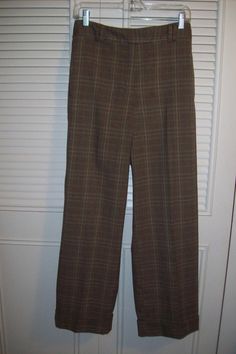 "Vintage brown plaid career fall and winter pants by Larry Levine. 14 Petite. Waist measures 34\", hip 42\", length 39\". PERFECT ! There are cuffs on the hem, belt loops, side pockets. Great pants ! No flaws of any kind. Stored with TLC Comes from a smoke-free home." Vintage Brown Winter Pants, Mens Brown Plaid Pants, Vintage Wide Leg Plaid Bottoms, 70s Mens Plaid Pants, Vintage Brown Plaid Pants, Winter Pants, Brown Plaid, Vintage Plaid, 1980s Vintage