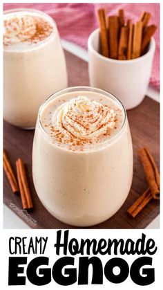 two glasses filled with eggnog and cinnamon sticks