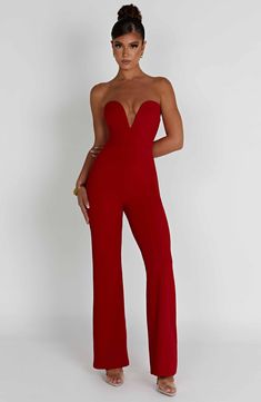 Jordi is all about the sleek glamour, cut from our ultra luxe stretch crepe to hug the body for a super cinched, curve defining fit. With a strapless, plunge neckline, the jumpsuit is complete with wide legs. Style yours with a sleek knot, heeled mules and a chic mini bag.    Colour:Ãƒâ€šÃ‚Â Red.  Premium stretch crepe.  Hugs the body.  Plunge neckline.  Strapless.  Wide legs.  Full length.  Model is an XS and is wearing an XS.   Size: XS, S, M, L, XL, XXL Homecoming Dresses Corset, Uzun Boy, White Dress Spring, Long Sleeve Homecoming Dresses, Split Long Dress, Overall Jumpsuit, Homecoming Dresses Long, Maxi Dress Sale, Popular Dresses