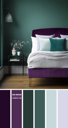 a bedroom with green walls and purple bedding in the middle, white pillows on top