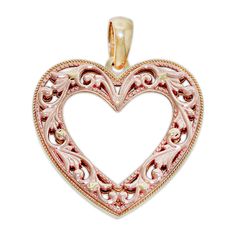 This lovely 14k Solid Gold Filigree Heart Charm is the perfect gift for that special someone in your life. The reversible charm is rose gold on one side and yellow gold on the other which can offer versatility to any outfit. Pink Heart-shaped Engraved Jewelry, Valentine's Day Pink Engraved Jewelry, Valentine's Day Filigree Jewelry For Anniversary, Pink Gold Jewelry For Anniversary On Valentine's Day, Pink Gold Jewelry For Valentine's Day Anniversary, Valentine's Day Filigree Open Heart Jewelry, Filigree Heart, Gold Filigree, Romantic Love