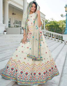 luxury Women White colored Salwar Kameez in Lehenga Style made with Net top and Chinon Chiffon Bottom fabric Processing Time : 8-10 Business Days Work : Embroidery, Gota Patti, Sequins & Lace Work Fabric: Top : Semi-Stitched Lehenga Choli Bottom : Chinon Chiffon Dupatta : Net #ladiessalwarkameez #salbar #salwaarsuitonlineshopping #salwarkameezforwomens #shalwarkameezladies #salwaarsuitsonlineshopping #ladiesshalwarkameez #churidarsalwars #salwarkameezwomen #shalwarkameezforwomen Luxury Semi-stitched Net Salwar Kameez, Luxury Chikankari Salwar Kameez For Navratri, Chiffon Lehenga, A Line Lehenga, White Dupatta, White Lehenga, Net Blouse, Net Top, Stitched Lehenga