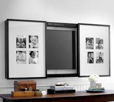 a black and white photo hanging on the wall above a mirror with multiple pictures in it