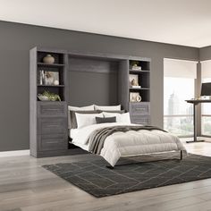 a bedroom with gray walls and white bedding