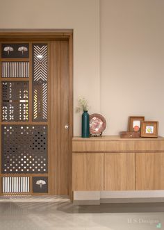 a wooden door with decorative designs on it