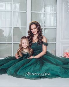 Emerald Green Dress, Mother Daughter Matching Dress, Green Tulle Gown Very romantic and long lace and tulle matching gowns are designed for the most beautiful photos. Adult dress is adjustable. Emerald green train dress is tailored of lace and soft tulle combined of two green shades Please note- if you need dresses for event please leave message on checkout , I will add linen to girls dress! Dress is possible in different colors. Contact me about color you wish. Dress is fully handmade, so some Green Tulle Gown, Baby Blue Maternity Dress, Emerald Green Wedding Dress, Maternity Gowns Formal, Green Wedding Dress, Tulle Gowns, Princess Dress Fairytale, Blue Maternity Dress, Emerald Green Wedding