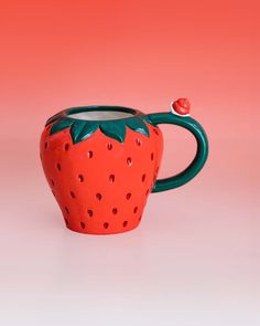 12 oz. strawberry ceramic mug with 3D snail on the handle on red and white ombre background Ceramic Mug Handles, Fun Architecture, Mug Handles, Strawberry Ceramic, Chilled Beer, Finger Lime, Kneeling Pad, Small Water Bottle, Mounted Bottle Opener