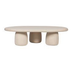 an oval table with three white bases on it's top and two smaller round bases at the base