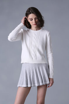 Made from a blend of high-quality cotton and cashmere, this sweater offers the perfect balance of warmth, softness, and breathability. The center cable knit design adds a touch of texture and visual interest, making it a versatile piece that can be dressed up or down. It’s perfect length gives it a modern look, perfect for pairing with jeans or skirts. With its cozy feel and timeless style, this sweater is a must-have for the upcoming season. Minnie Rose, Cashmere Pants, Cashmere Jacket, Cashmere Dress, Cashmere Accessories, Cashmere Turtleneck, Crop Sweater, Collar Sweater, Cotton Cardigan