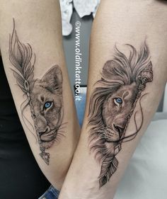 two tattoos on both legs with lions and feathers in the middle one has blue eyes