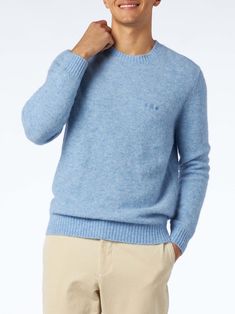 Man crewneck light blue sweaterStretch wool fabricSt. Barth embroideryRibbed collar bottom and cuffsRegular fitTrue to sizeSt. Barth logo on the sleeveComposition: 73% baby alpaca 25% Polyamide 2% elastant Crew Neck Blue Cashmere Sweater, Blue Crew Neck Cashmere Sweater, Blue Cashmere Crew Neck Top, Blue Wool Tops With Ribbed Cuffs, Classic Blue Crew Neck Sweater, Classic Blue Crew Sweater, Classic Light Blue Winter Sweater, Men Crewneck, Boho Swimwear