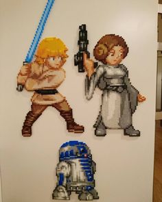 the star wars are made out of legos, and they look like pixel art