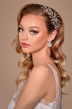 a woman wearing a bridal hair comb