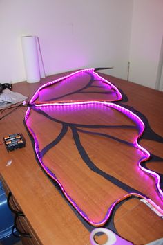 a table that has some kind of neon light on it