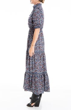 Add this smocked sleeve printed dress to your chic closet completing a stylish ensemble.Fit: this style fits true to size. Flowy Casual Maxi Dress With Elastic Neckline, Casual Flowy Maxi Dress With Elastic Neckline, Casual Tiered Maxi Dress With Ditsy Floral Print, Maxi Dress With Elastic Neckline For Daywear, Casual Maxi Dress With Ruffle Hem, Casual Maxi Dress With Smocked Back And Tiered Skirt, Casual Maxi Length Tiered Dress With Smocked Bodice, Casual Tiered Skirt Maxi Dress For Daywear, Casual Tiered Dress With Elastic Waistband