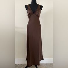 Material: 97% Poly 3% Spandex Approx Measurements Laying Flat Pit To Pit 15" Waist 14" Length 50" Brown Fitted V-neck Slip Dress, V-neck Stretch Satin Midi Dress, Fitted V-neck Satin Maxi Dress, Fitted Satin Maxi Dress With V-neck, Fitted Satin Sheath Maxi Dress, Fitted V-neck Midi Dress With Bias Cut, Fitted Brown Slip Dress, Fitted Brown Slip Dress For Evening, Fitted Brown Slip Dress For Night Out